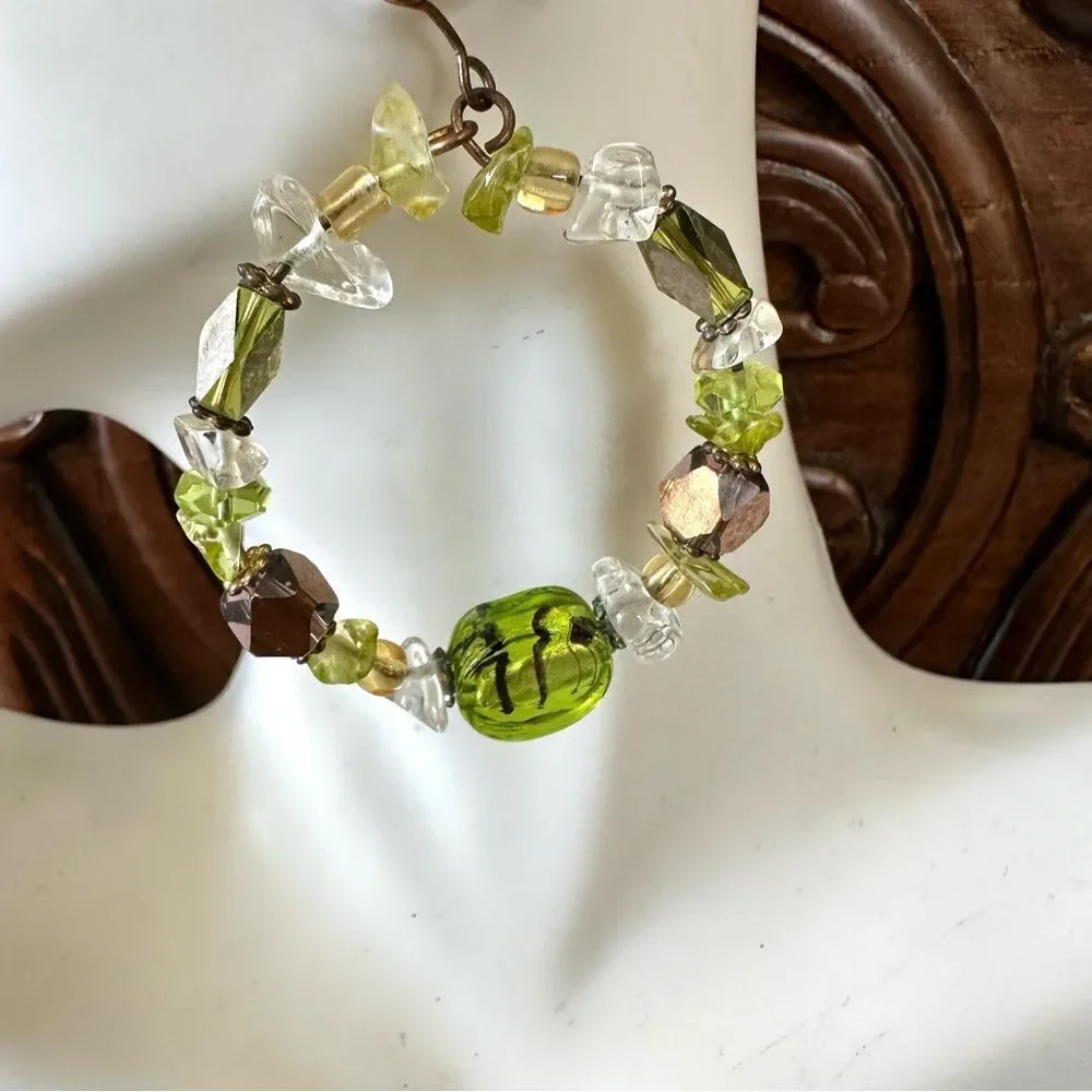 Green beaded circle earrings